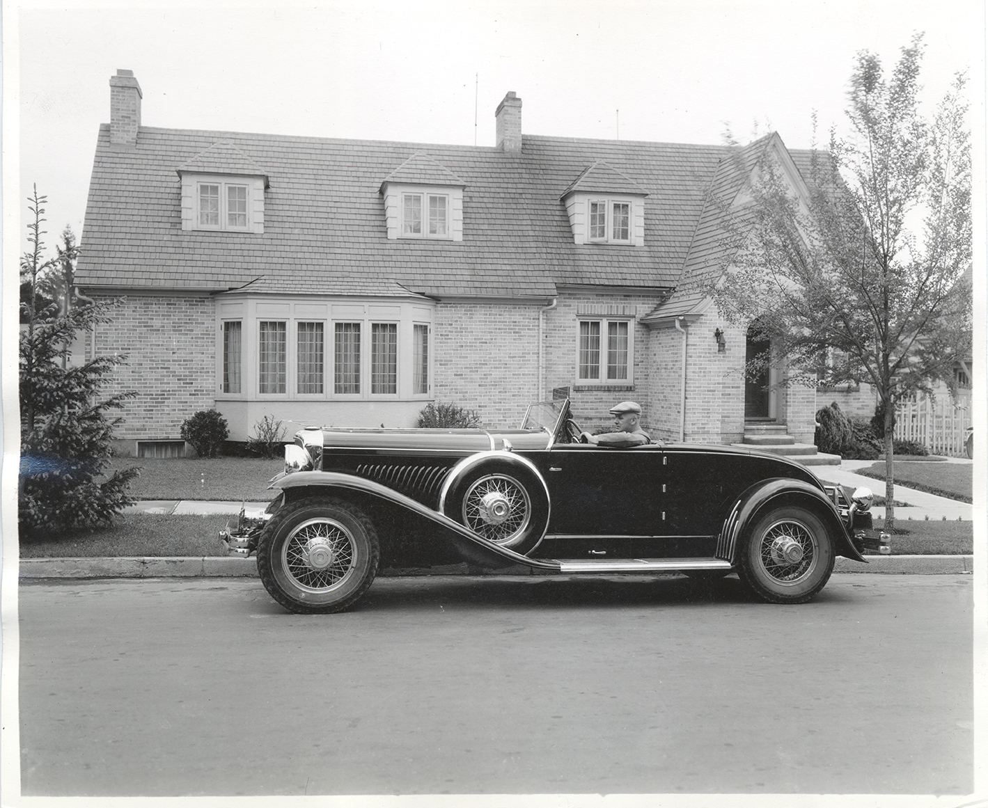 Photograph of Frank B. Robinson in his Duesenberg Convertible Coupe